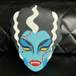 Love Pain and Stitches/Micheline Pitt Bride bag